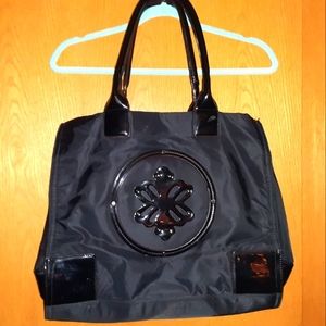Large black tote bag.  Patent leather accents